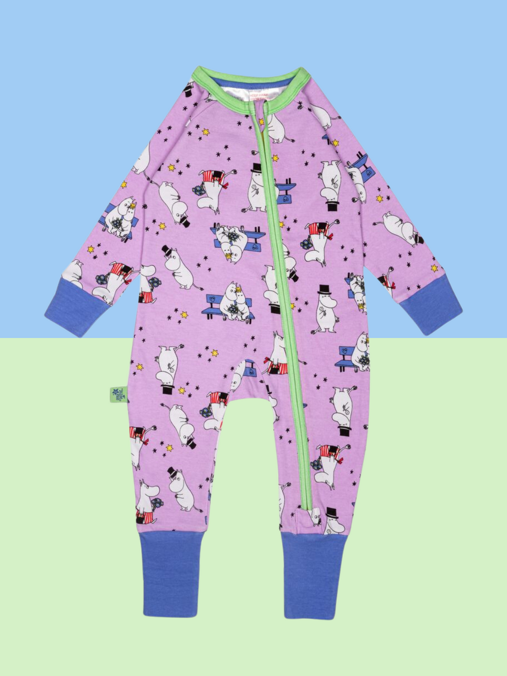 Purple children's onesie with cartoon characters on a blue and green gradient background