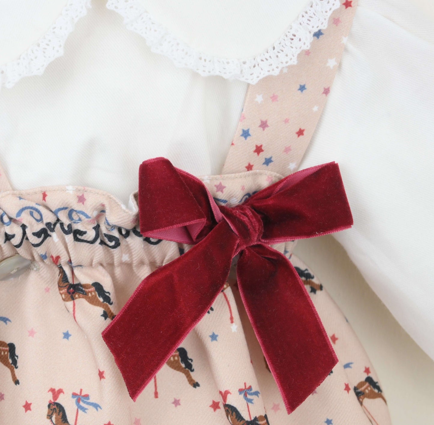 Carousel skirt with a red velvet bow