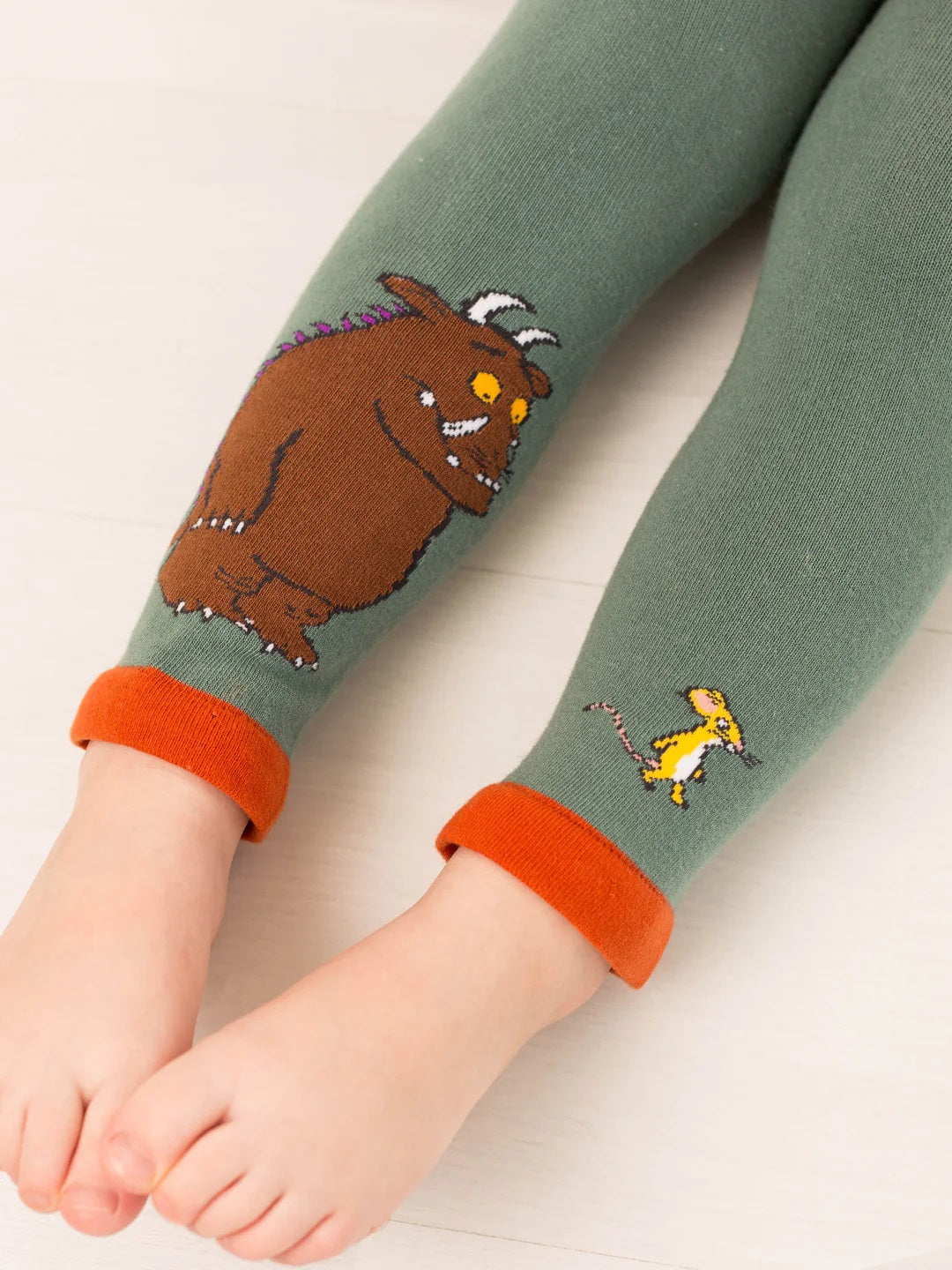 Children's leggings with Gruffalo cartoon characters design on a light background