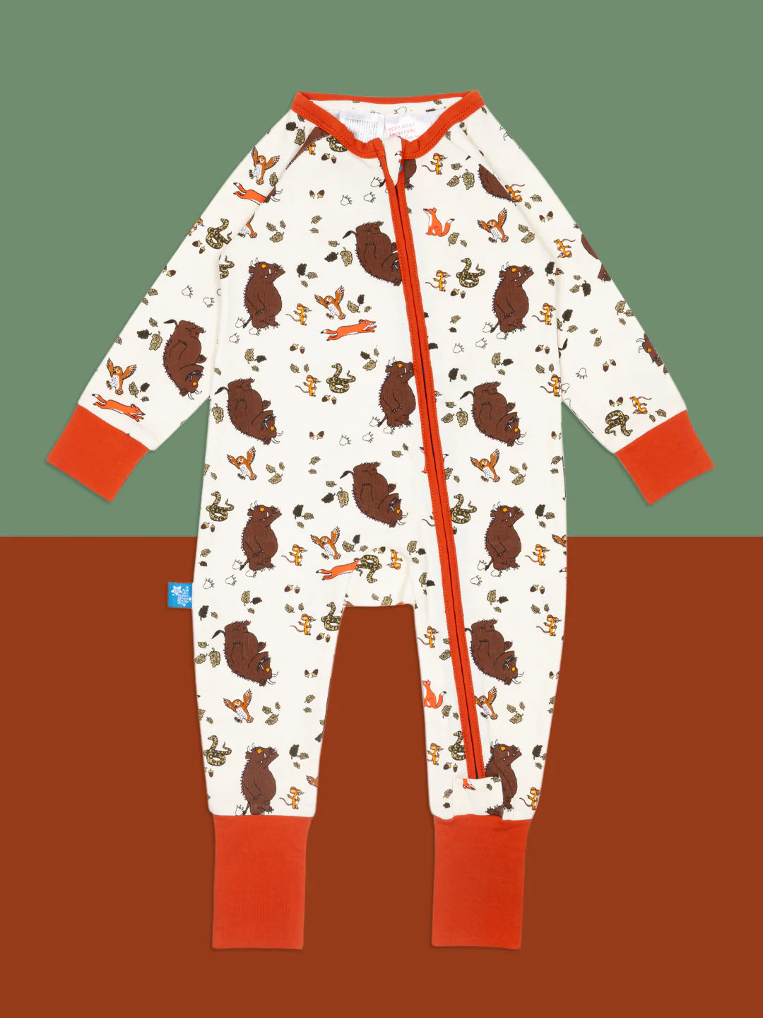 Children's onesie with gruffalo pattern on a gradient background