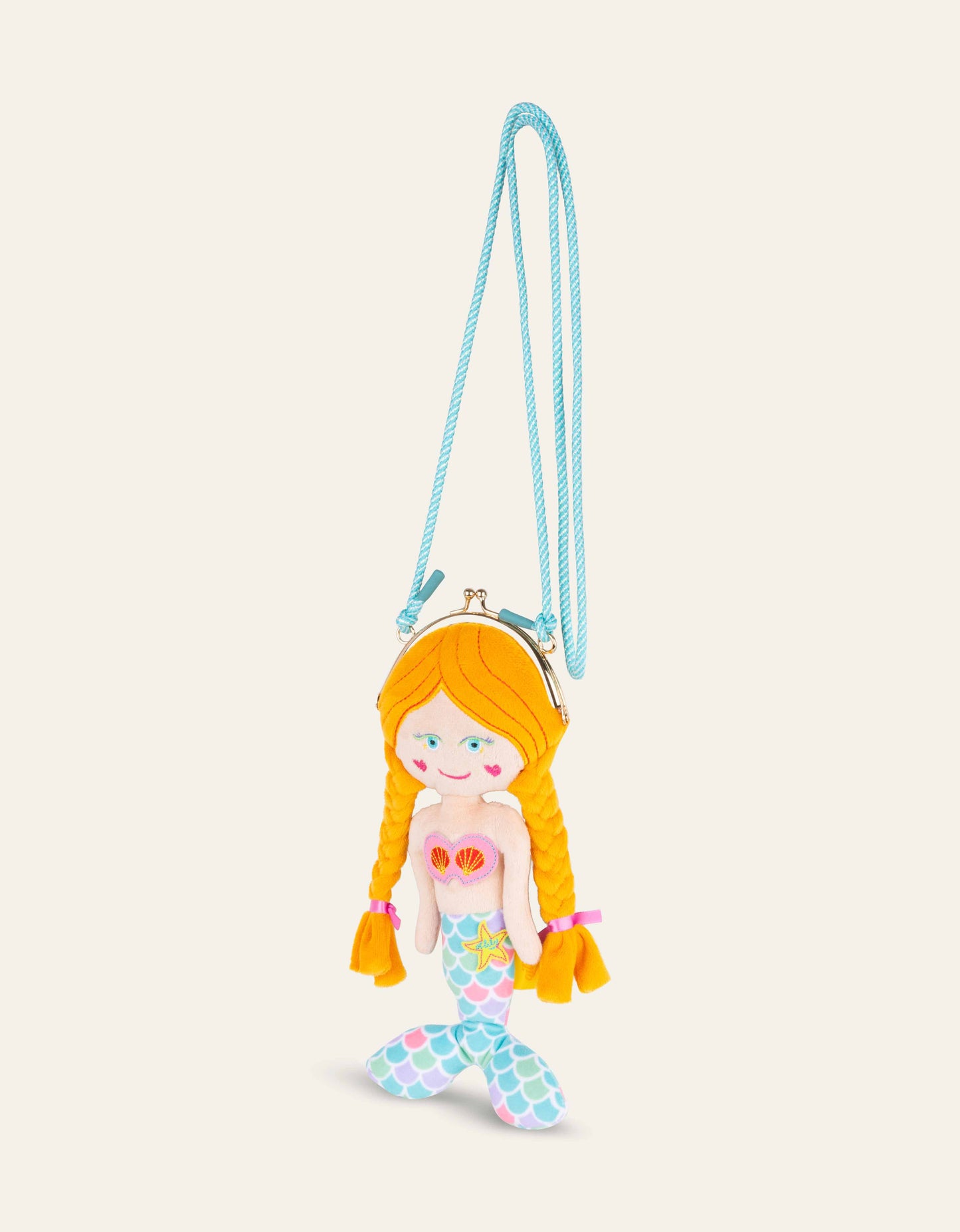 Mermaid-shaped purse with a rope on a beige background