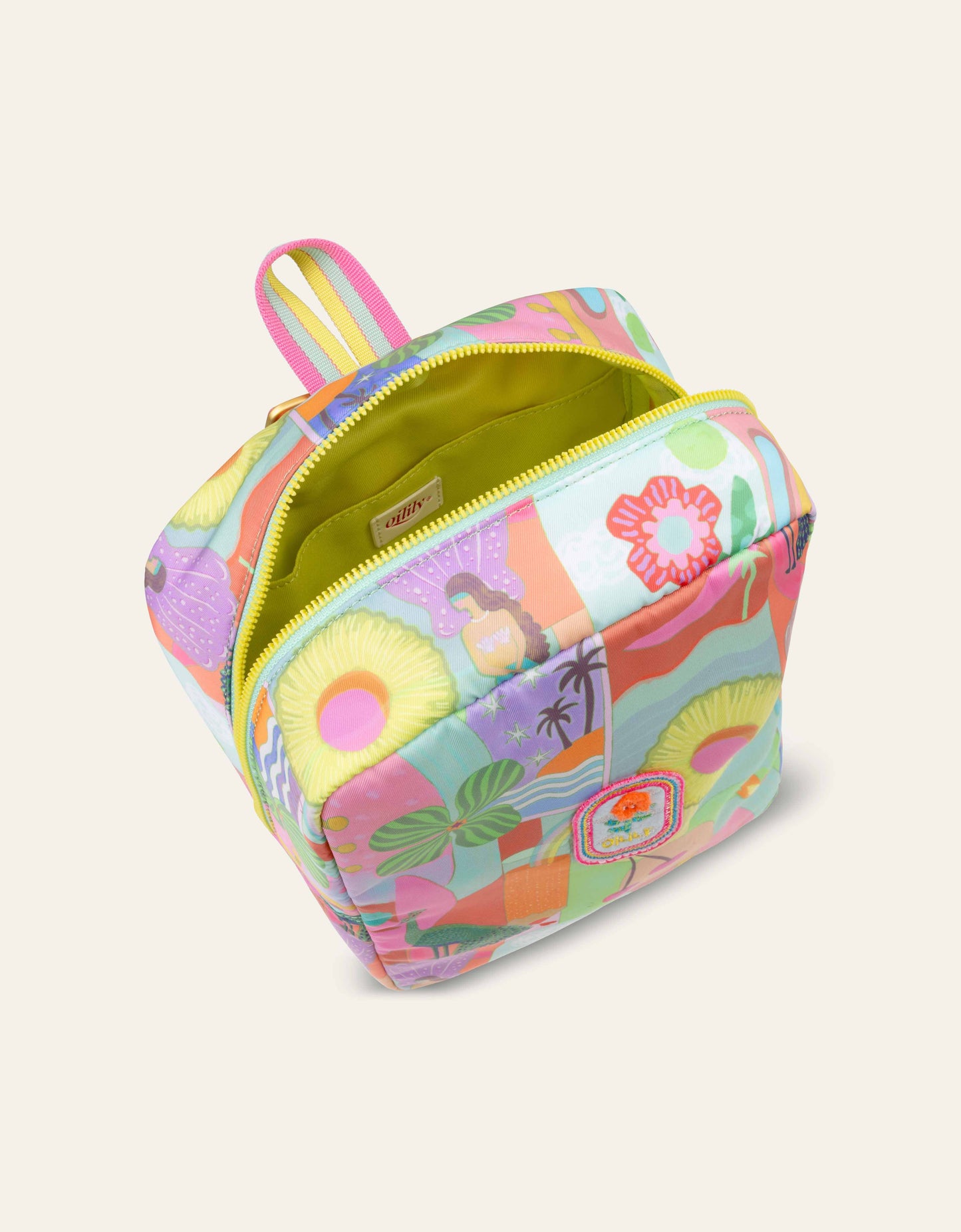 Colorful backpack with floral and beach-themed design on a light beige background