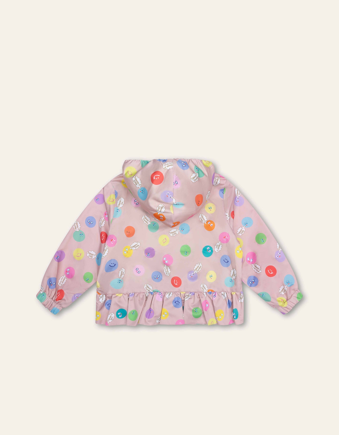 Pink children's raincoat with colorful circle pattern on a white background