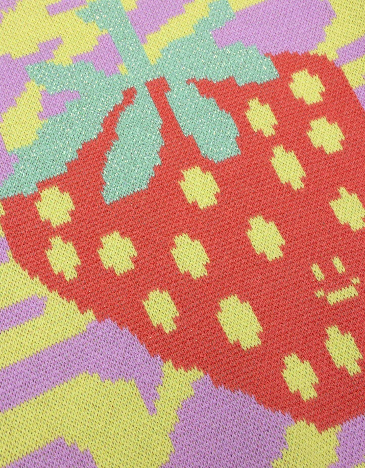 Close-up of a colorful strawberry pattern on fabric.