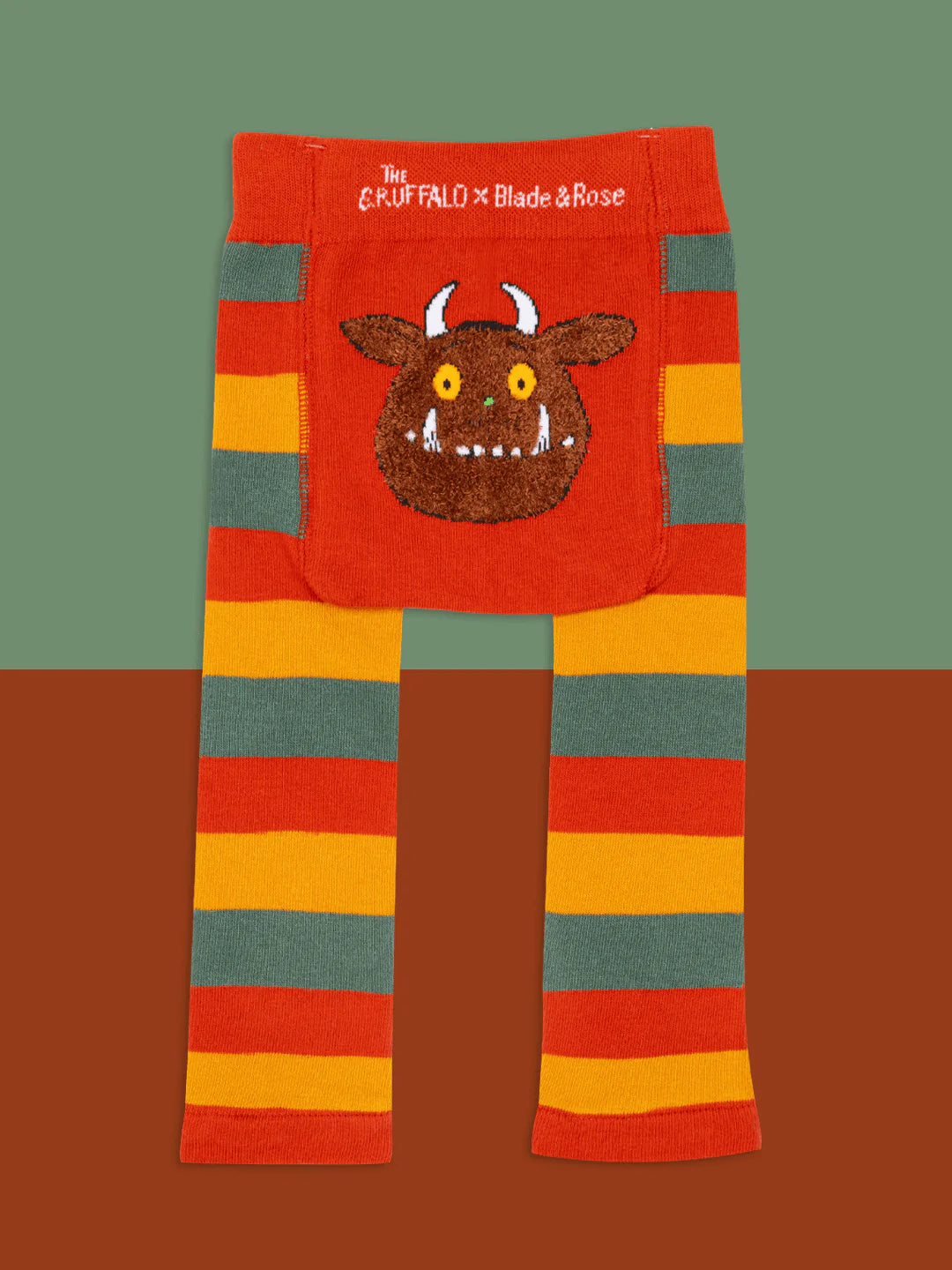 Colorful striped leggings with a Gruffalo character on a gradient background