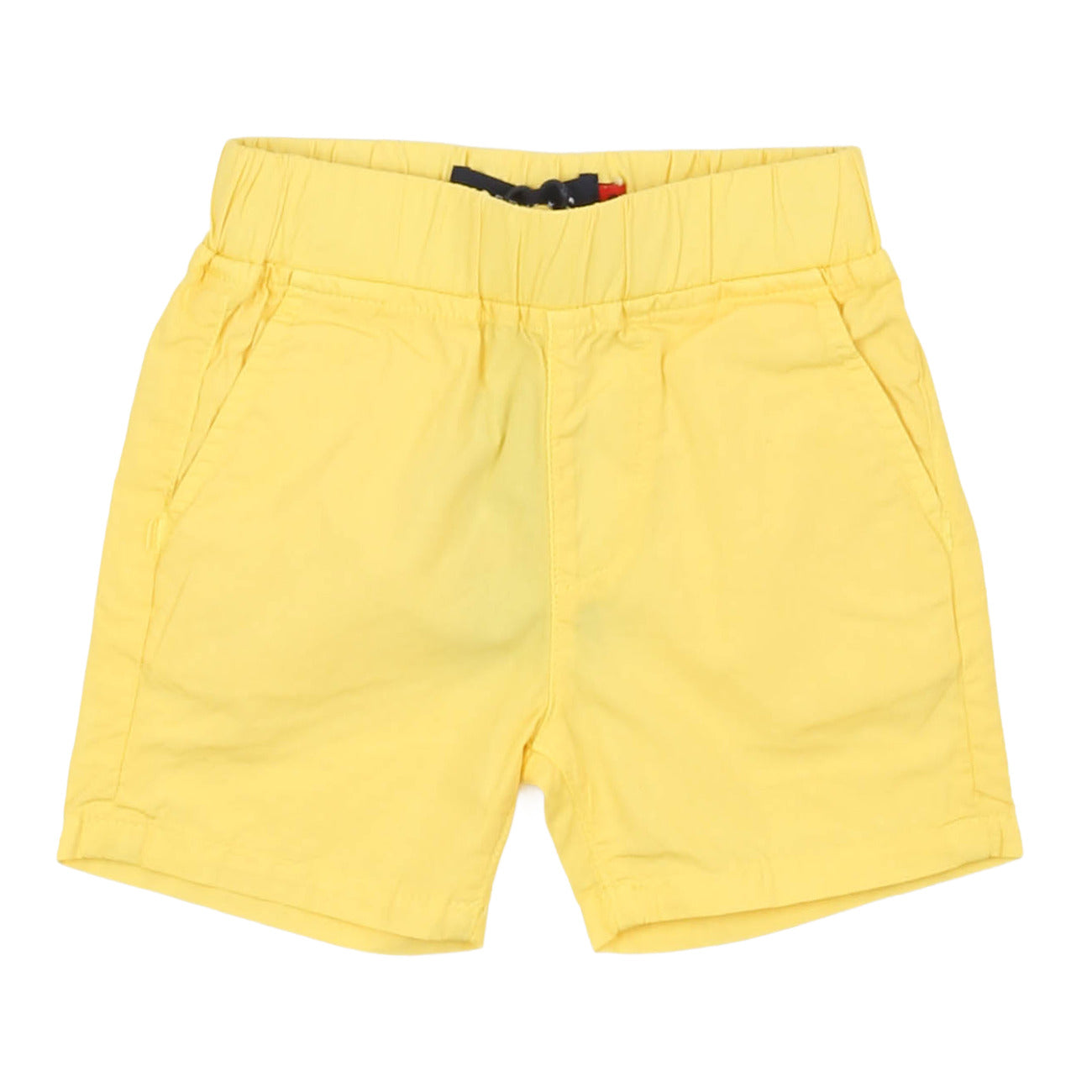 Yellow boys shorts on a white background