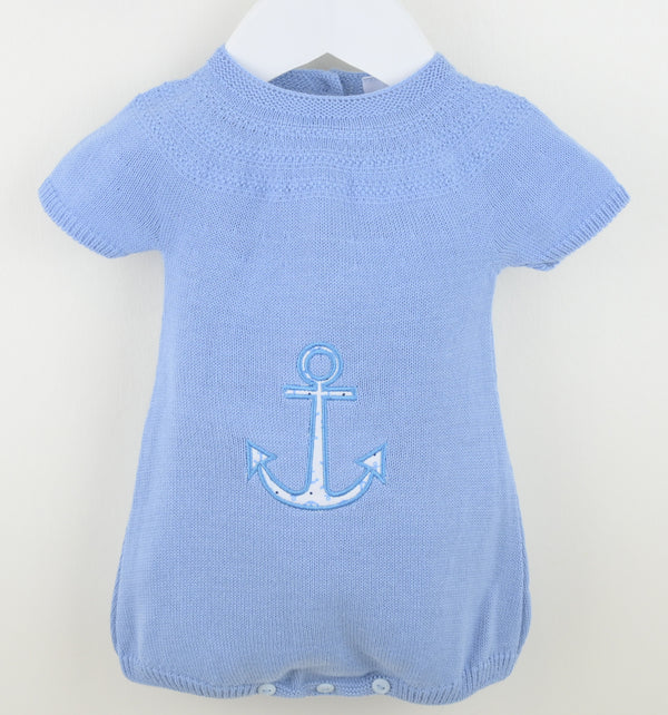 Blue baby romper with an anchor design on a white background