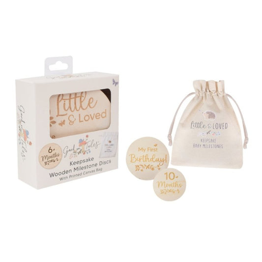 Baby milestone discs with packaging and drawstring bag on a white background