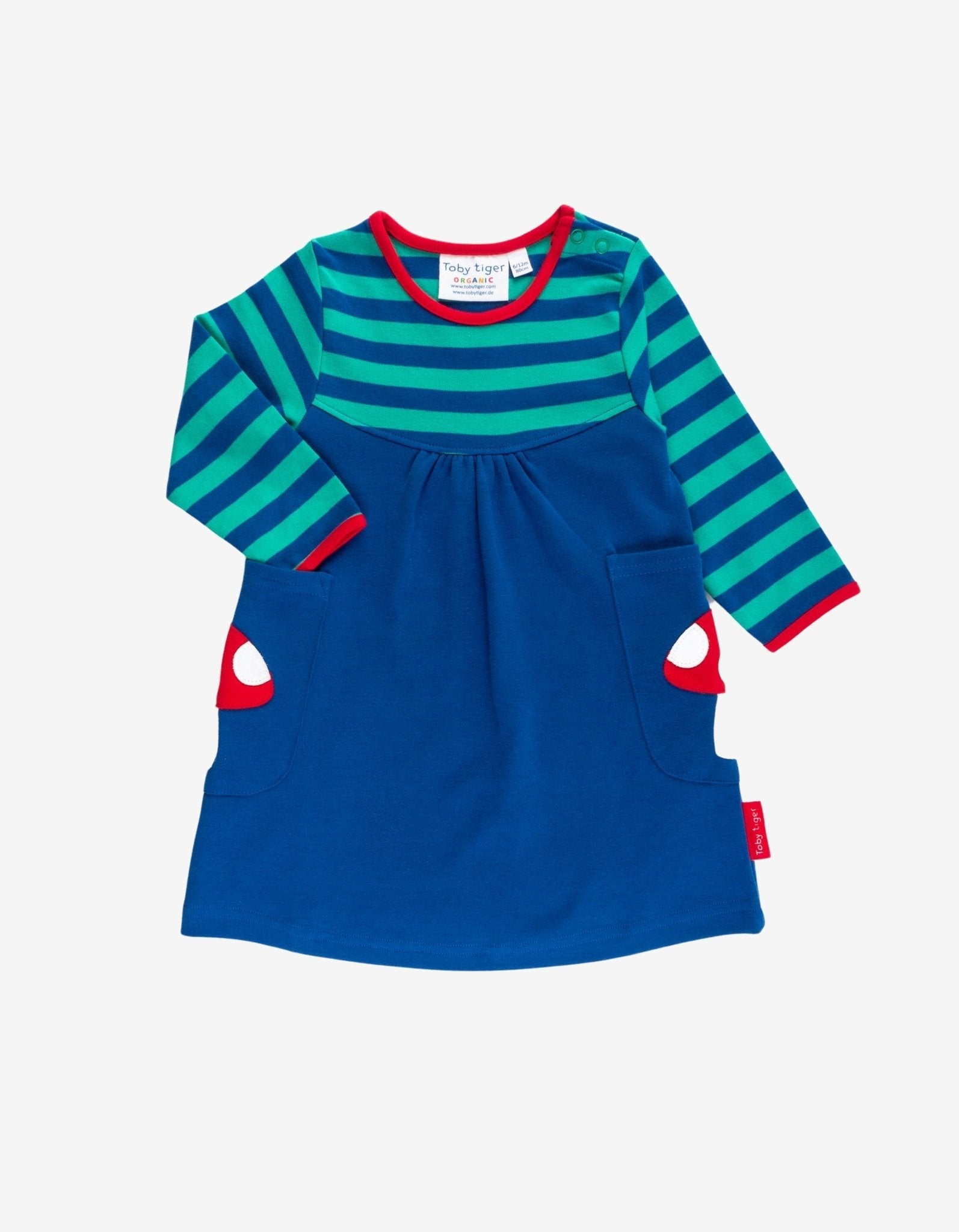 Children's dress with green and blue striped top and blue bottom with mushroom detailing
