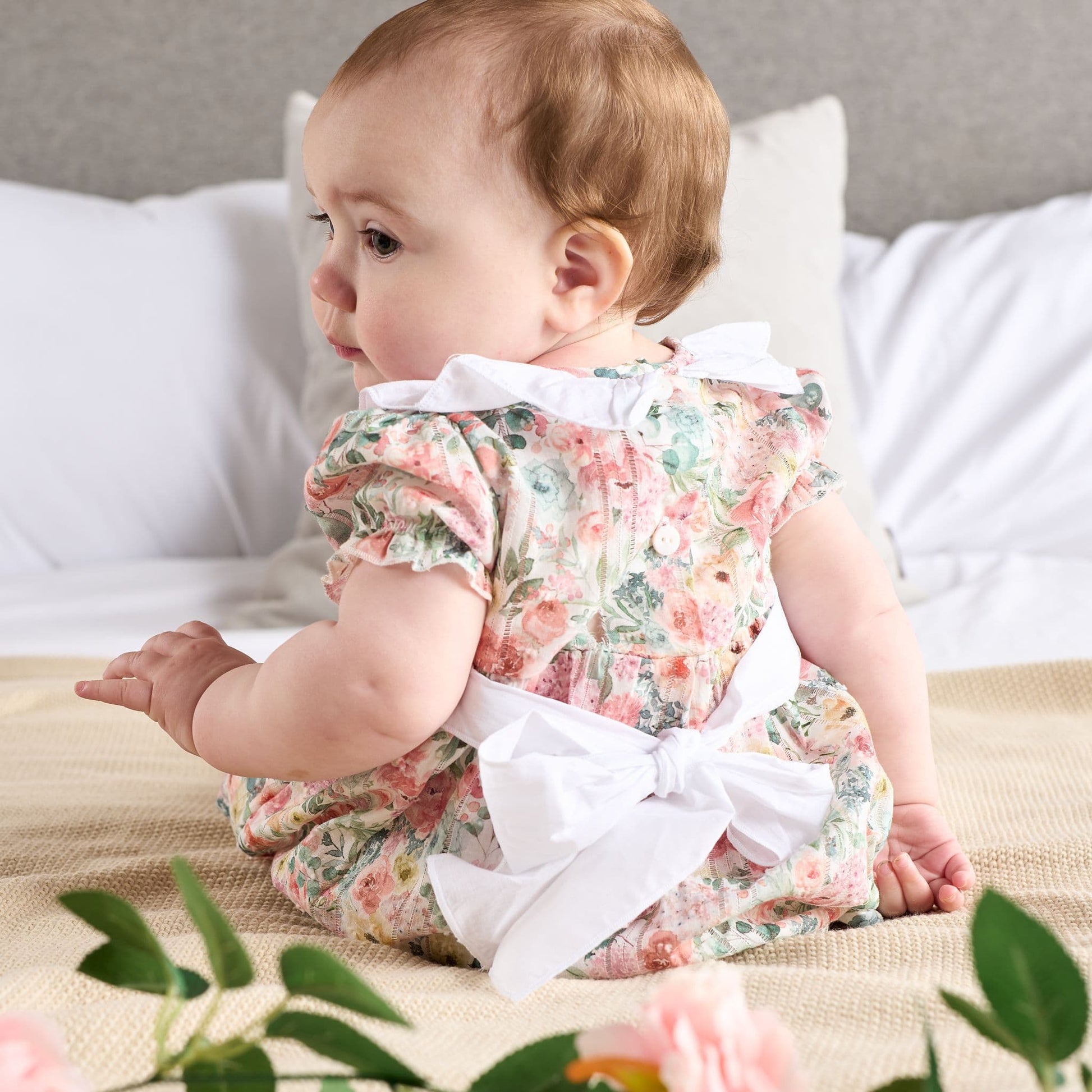 Back view of Dandelion baby girls floral dress and bloomers set