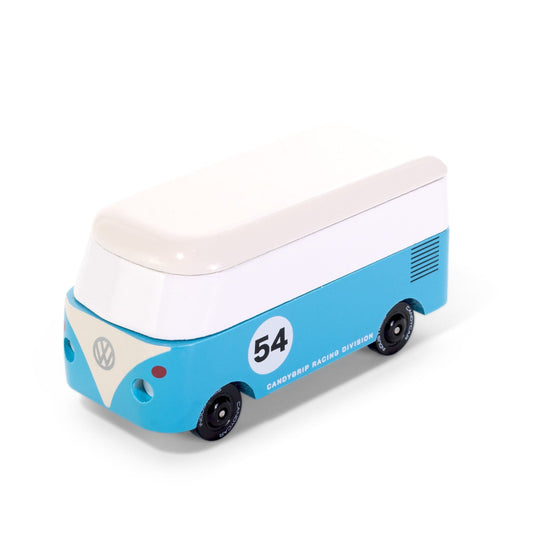 Toy bus with blue body and white top on a white background