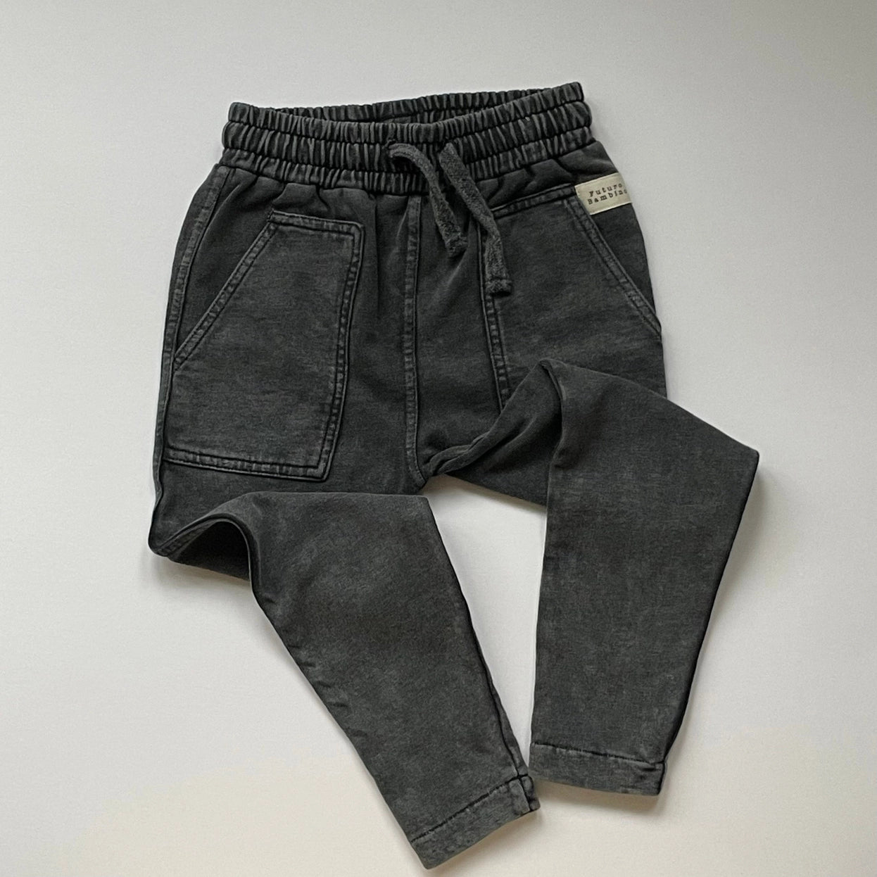 Relaxed-fit charcoal kids’ trousers by Futuro Bambino