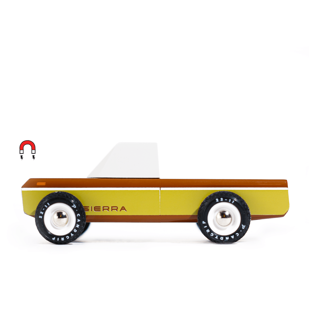 Toy truck model of a Chevrolet Sierra on a white background