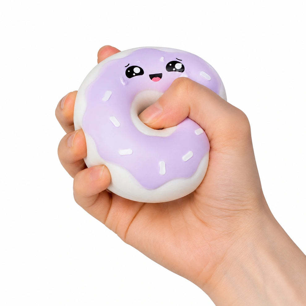 Doughie the Donut realistic squishy toy in hand 