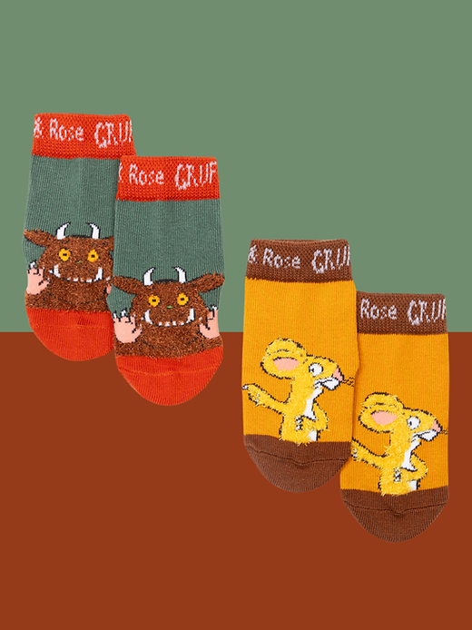 Two pairs of Gruffalo socks with cartoon characters on a gradient background