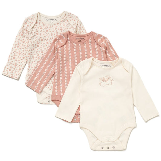 Three baby bodysuits with floral and patterned designs on a white background