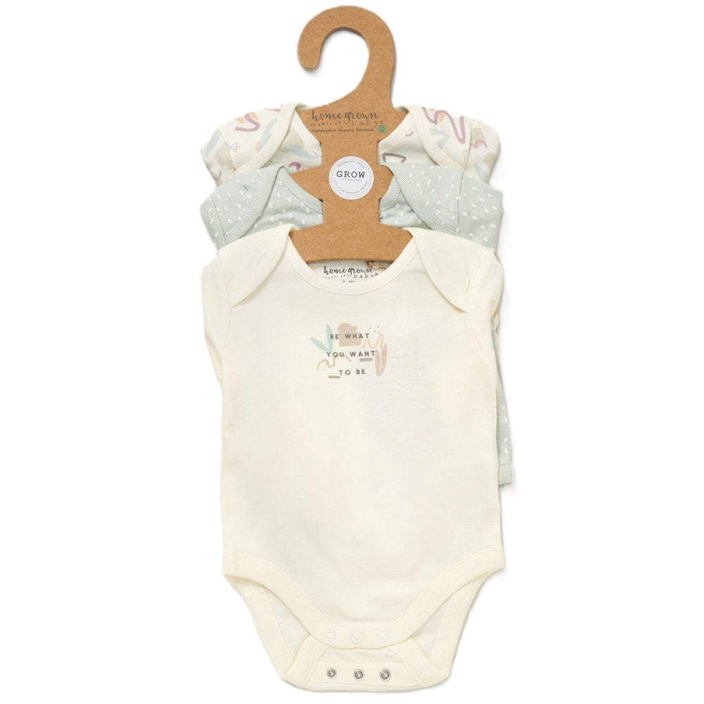 3 pack of organic baby vests on a sustainable hanger.