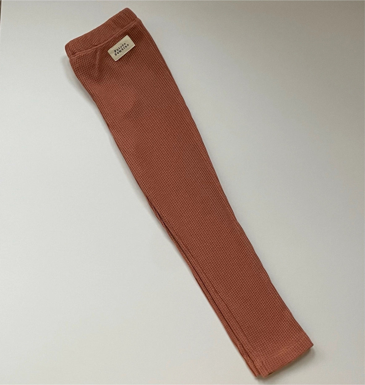 Kids’ organic cotton leggings in rust
