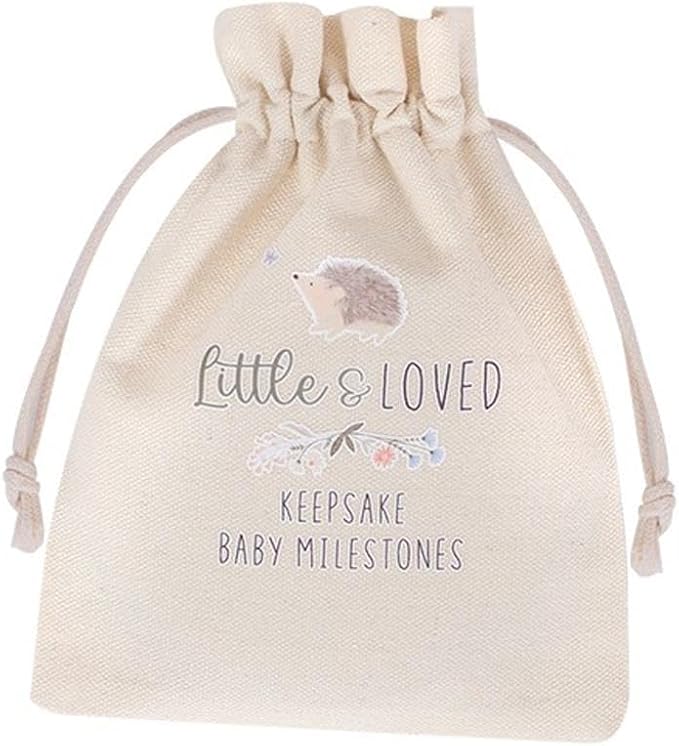 Beige drawstring bag with 'Little & Loved' text and hedgehog illustration on a white background