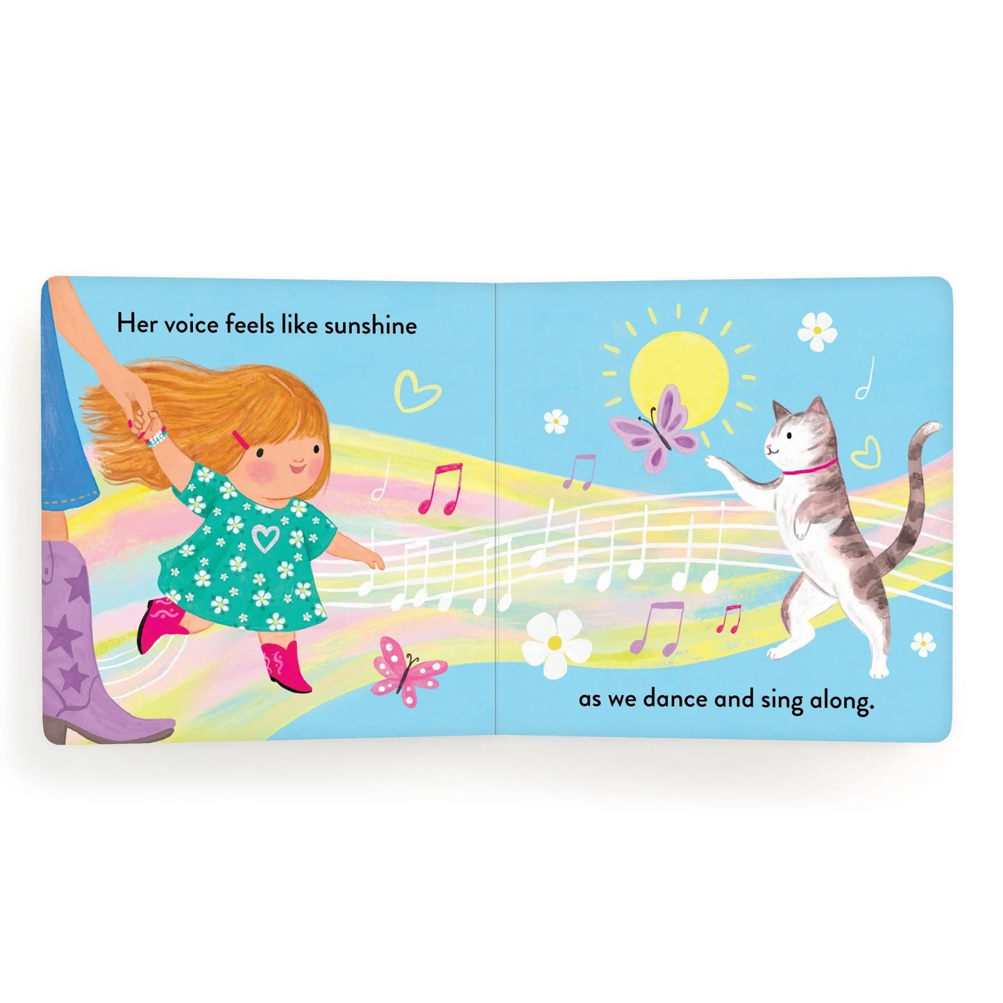 Children's book page with a girl, cat, and butterflies on a blue background