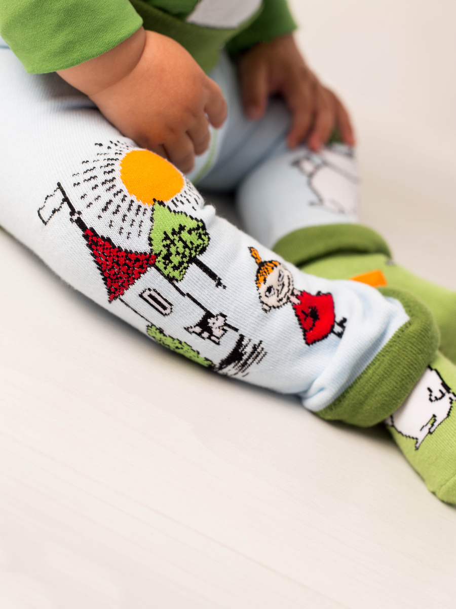 Children's Moomin leggings with colorful designs on a white background