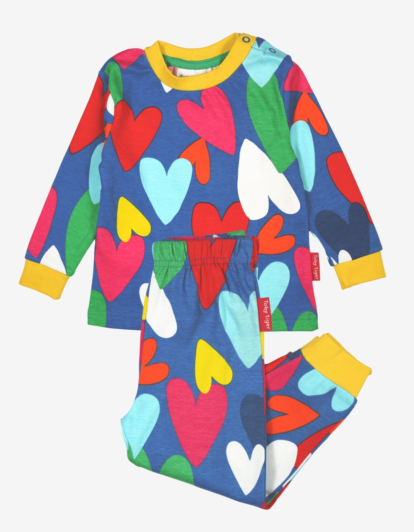 Children's pyjama set with colourful heart pattern on a white background
