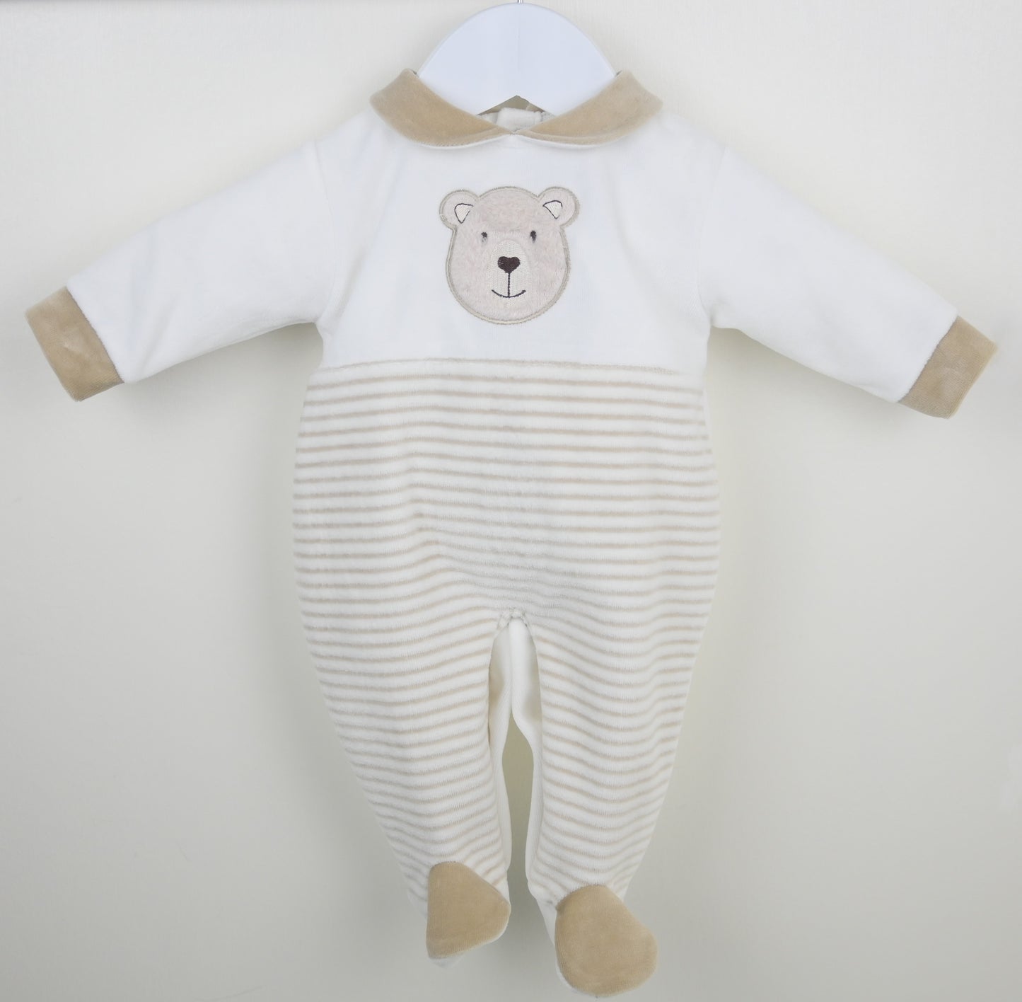 Baby onesie with bear design on a white background