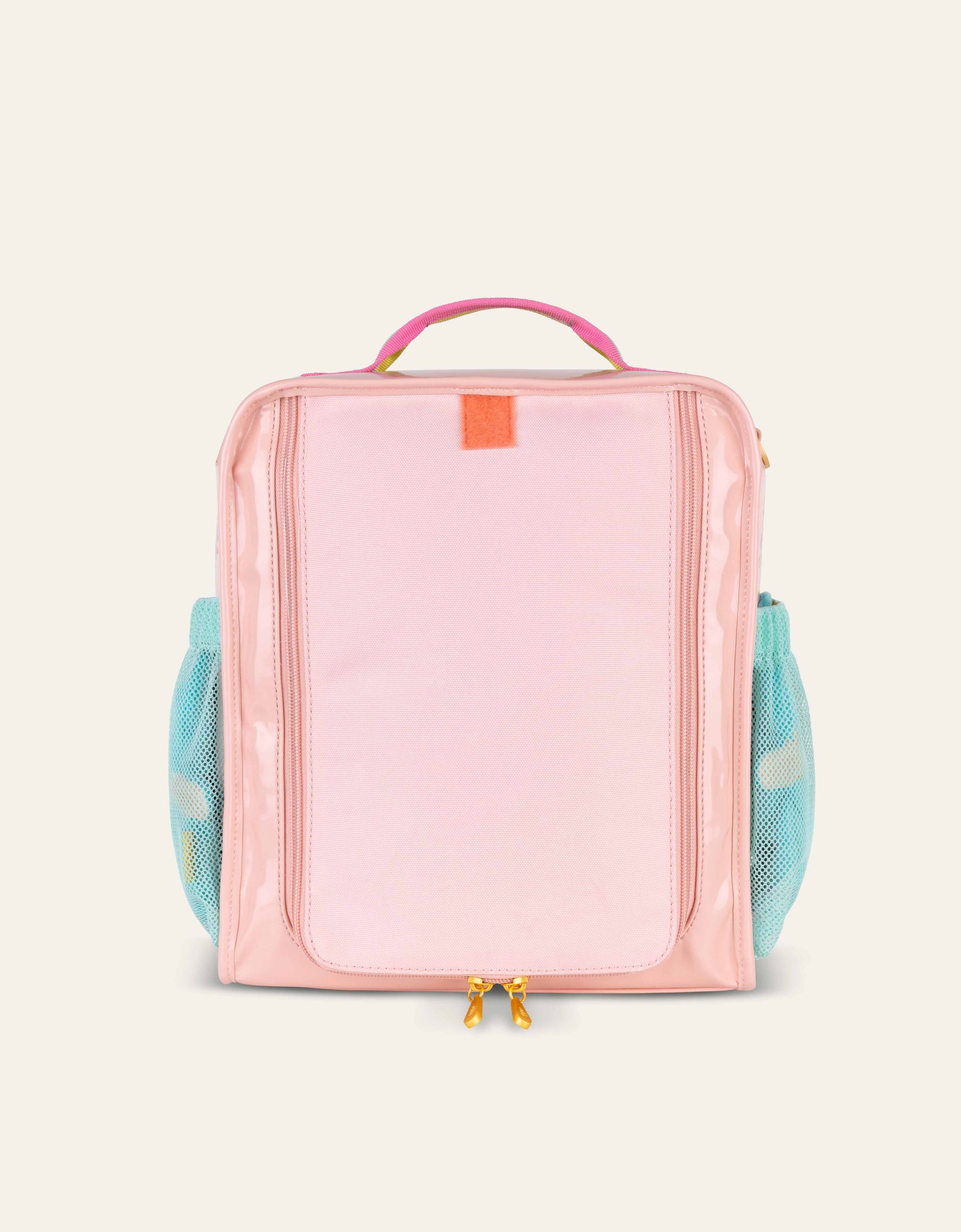 Pink travel bag with mesh side pockets on a light beige background