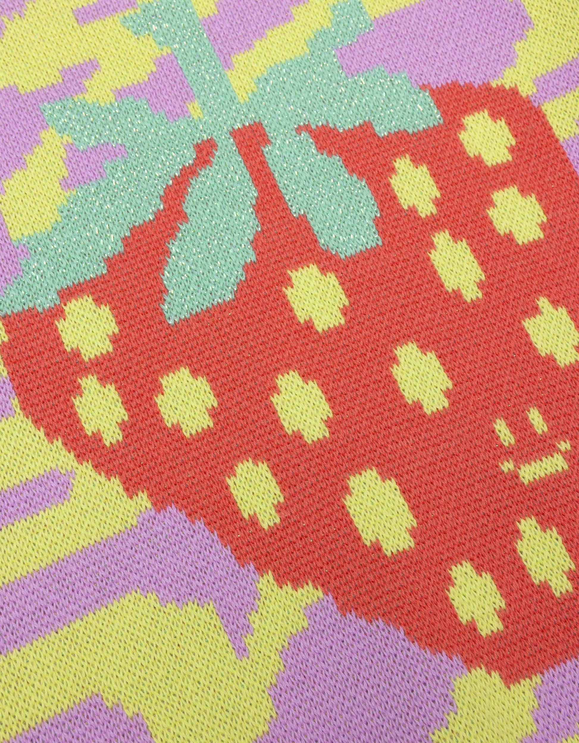 Close-up of a colorful strawberry pattern on fabric.