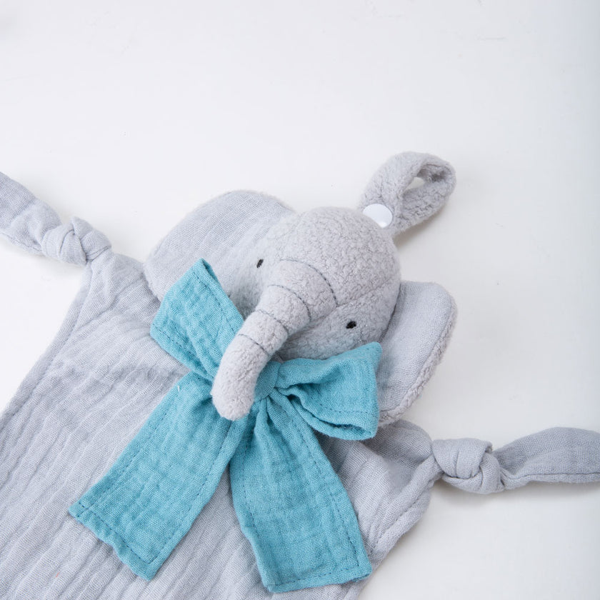 Gray elephant plush toy with a blue bow on a white background