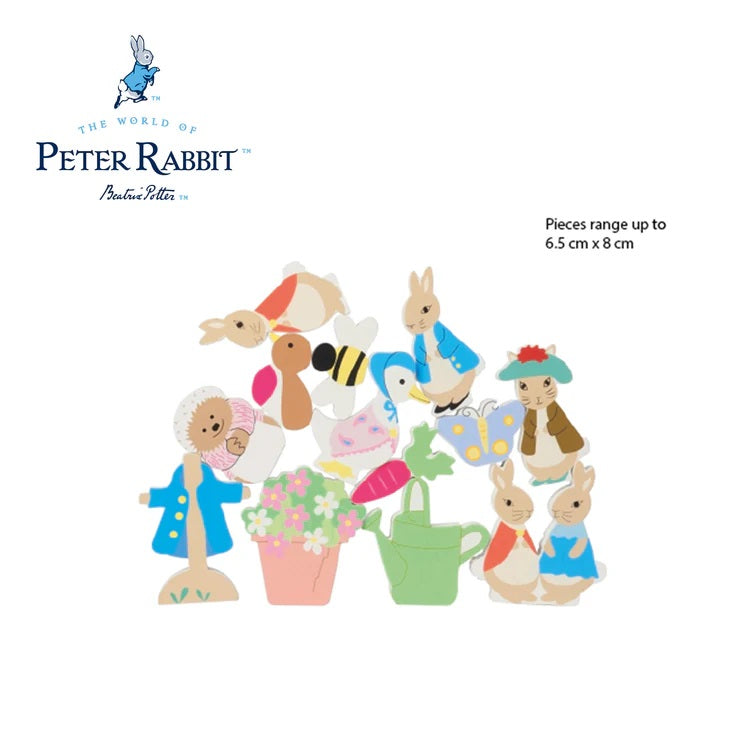 Collection of Peter Rabbit-themed figurines on a white background with 'The World of Peter Rabbit' branding.