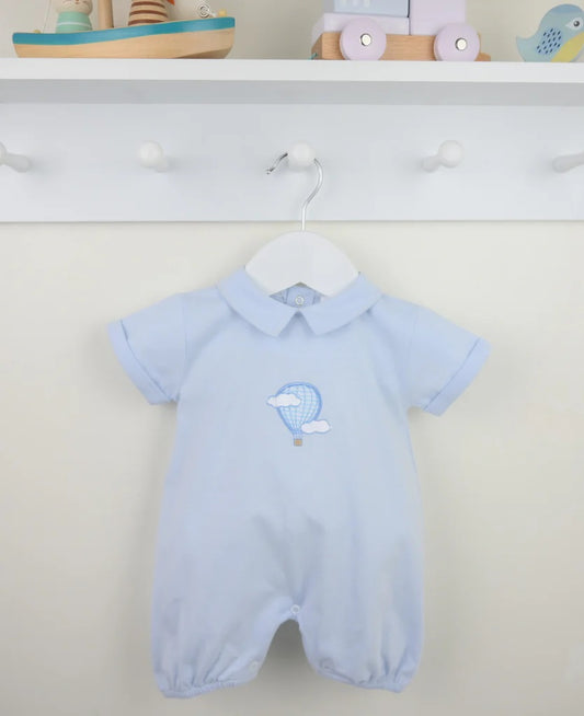 Light blue baby romper with collar and embroidered balloon design on a white background