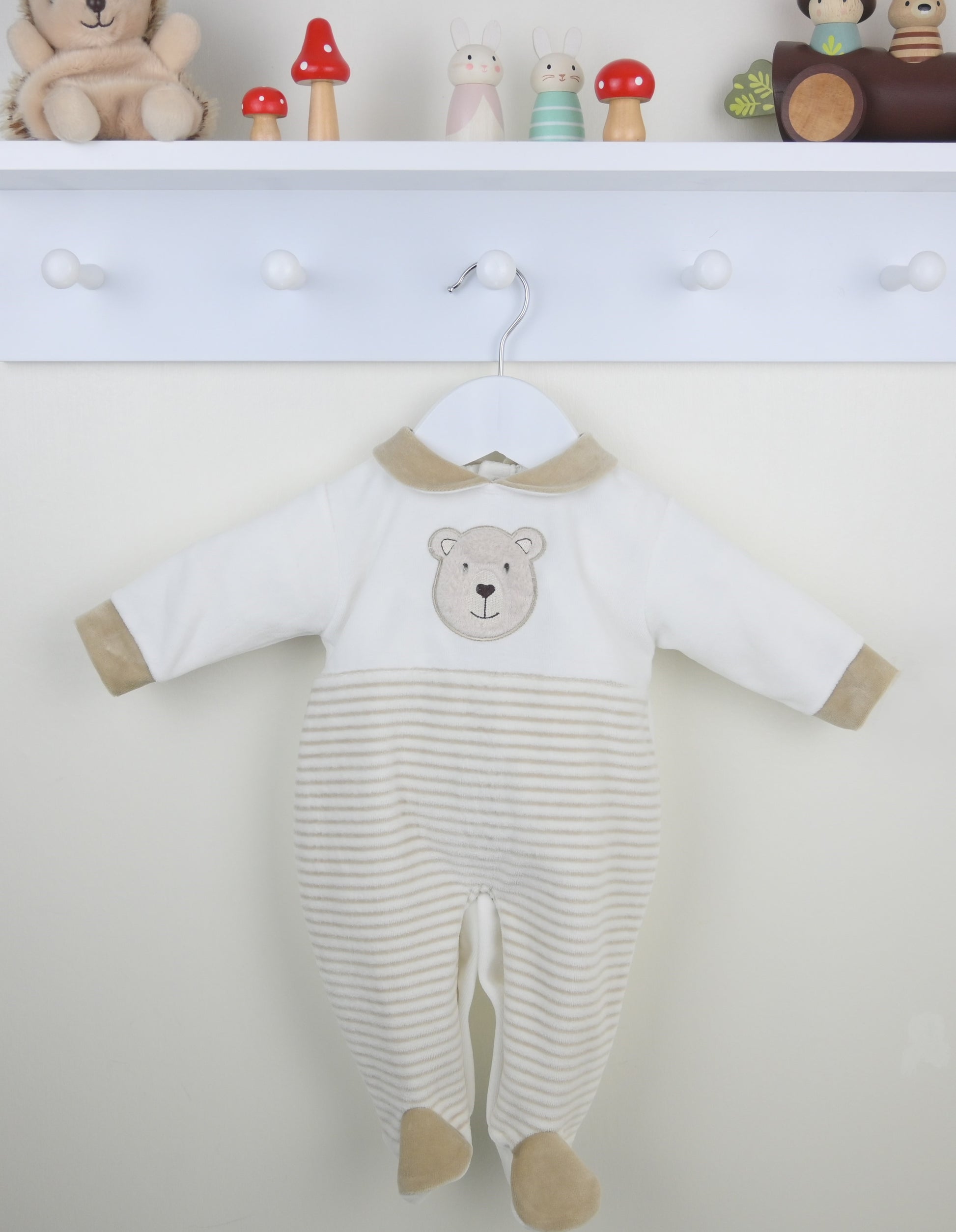 Baby onesie with bear design on a white background