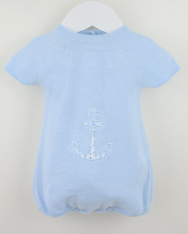 Light blue baby romper with an anchor design on a white background