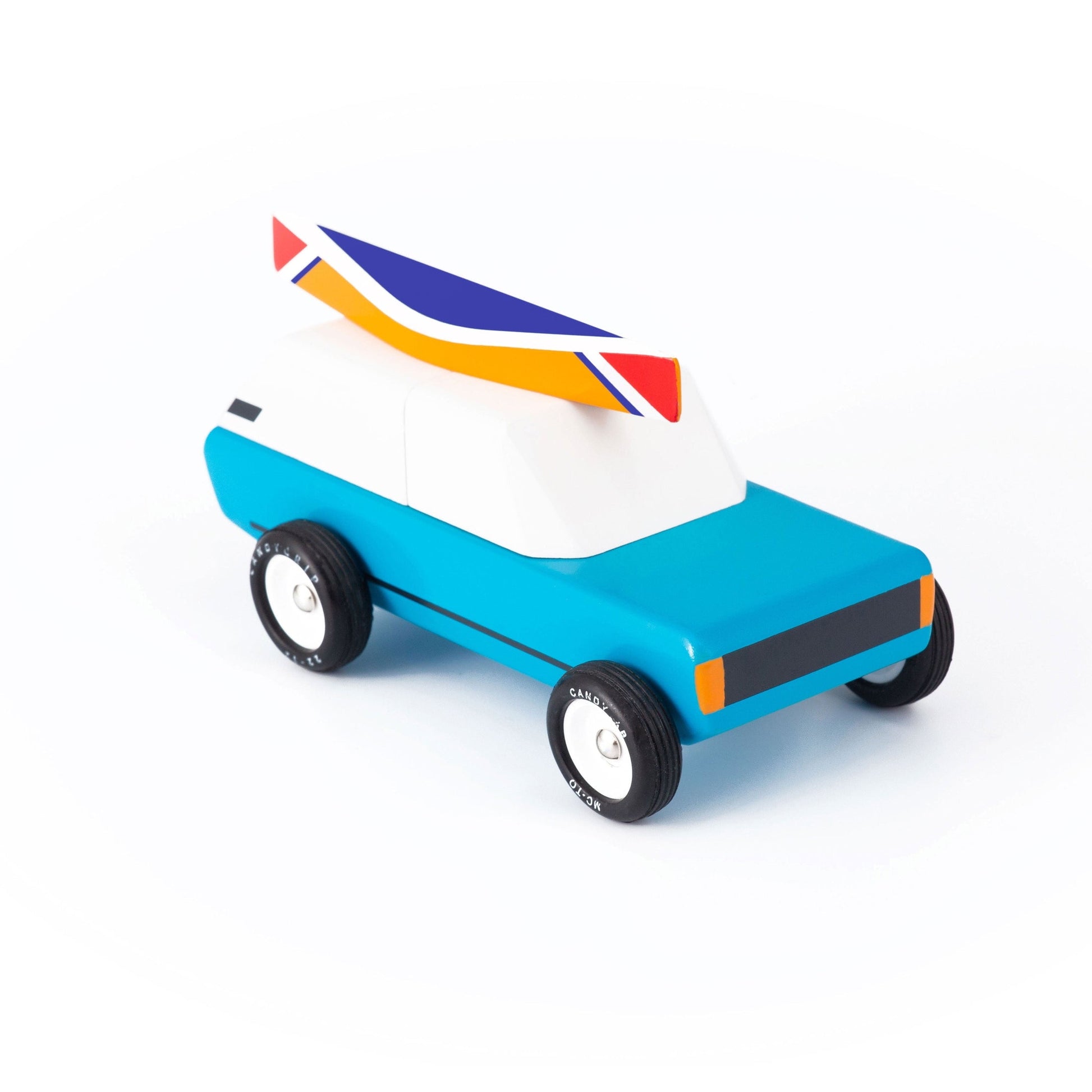 Toy car with a colorful roof on a white background