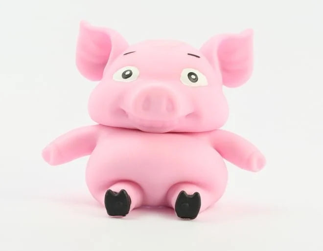 Pink squishy and stretchable pig toy for children.