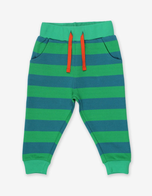 Green and blue striped pants with red drawstrings on a white background