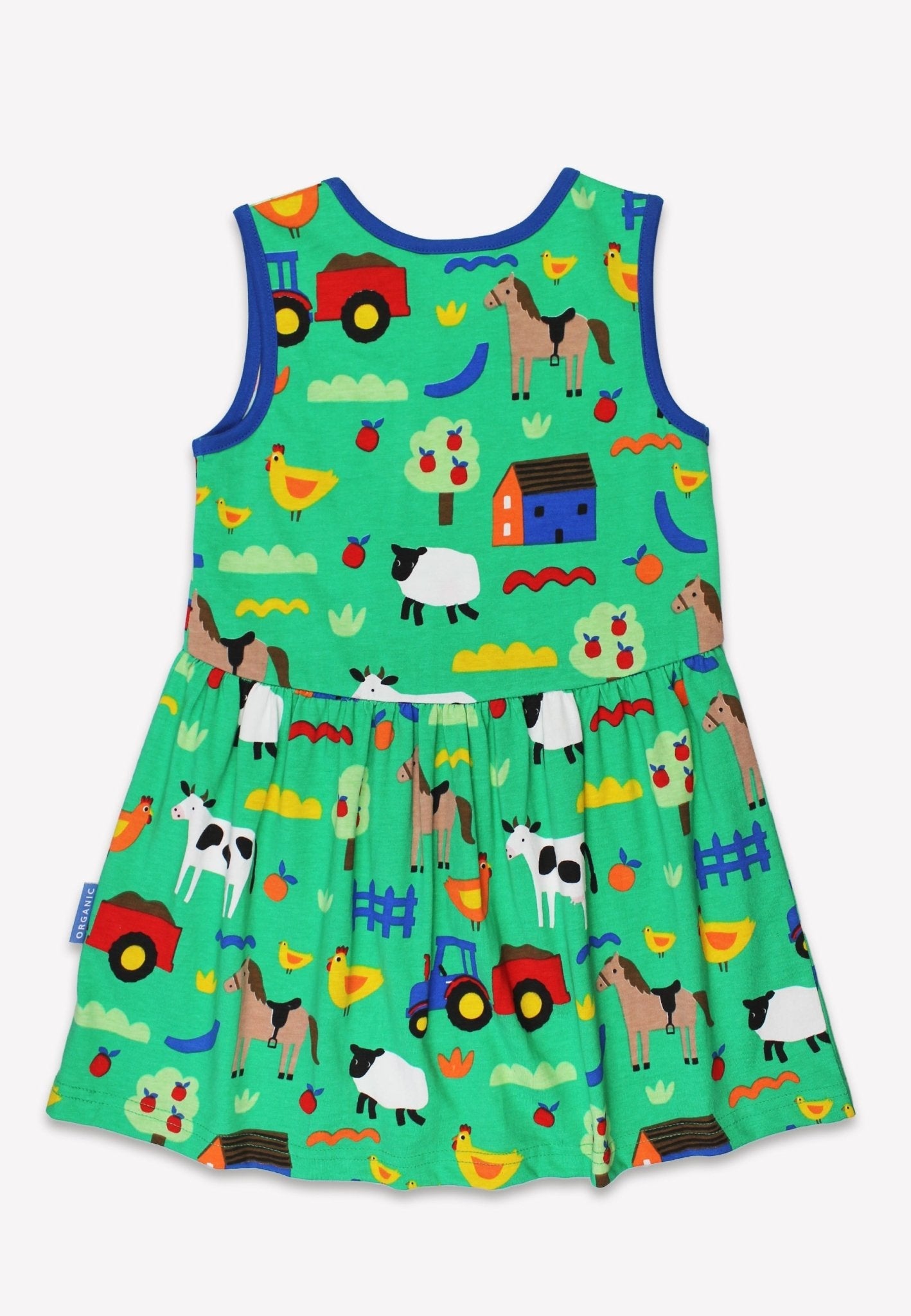Back of Children's dress with farm animal pattern on a white background