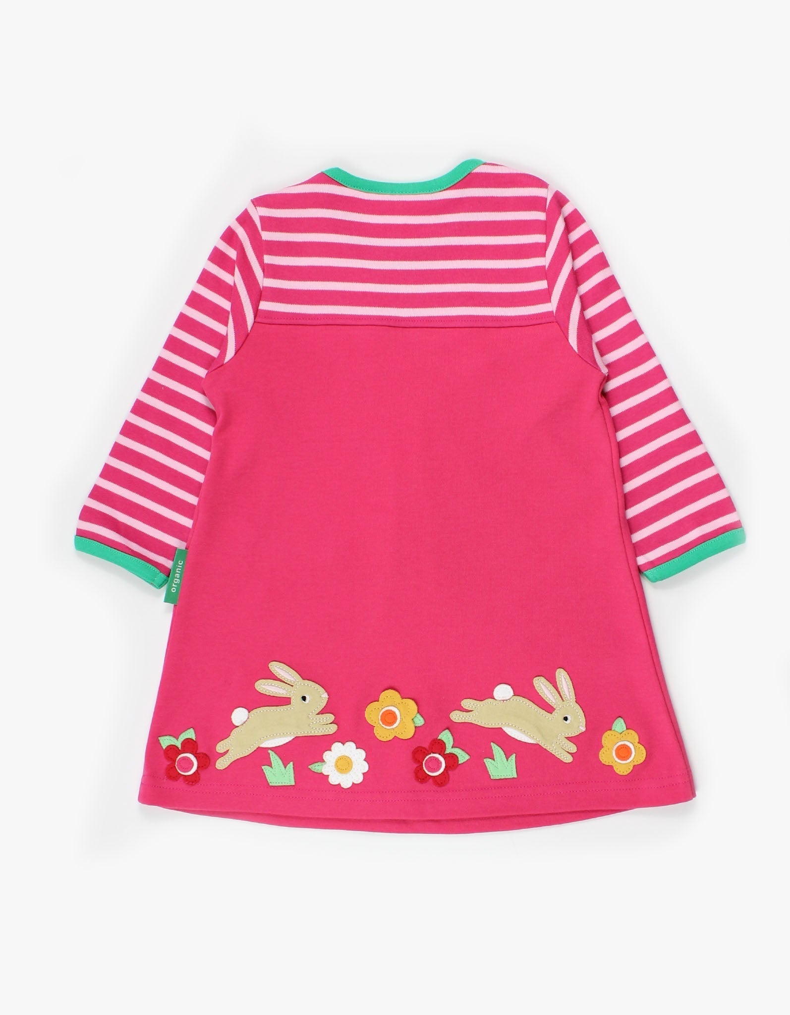 Pink dress with striped sleeves and bunny designs on a white background.
