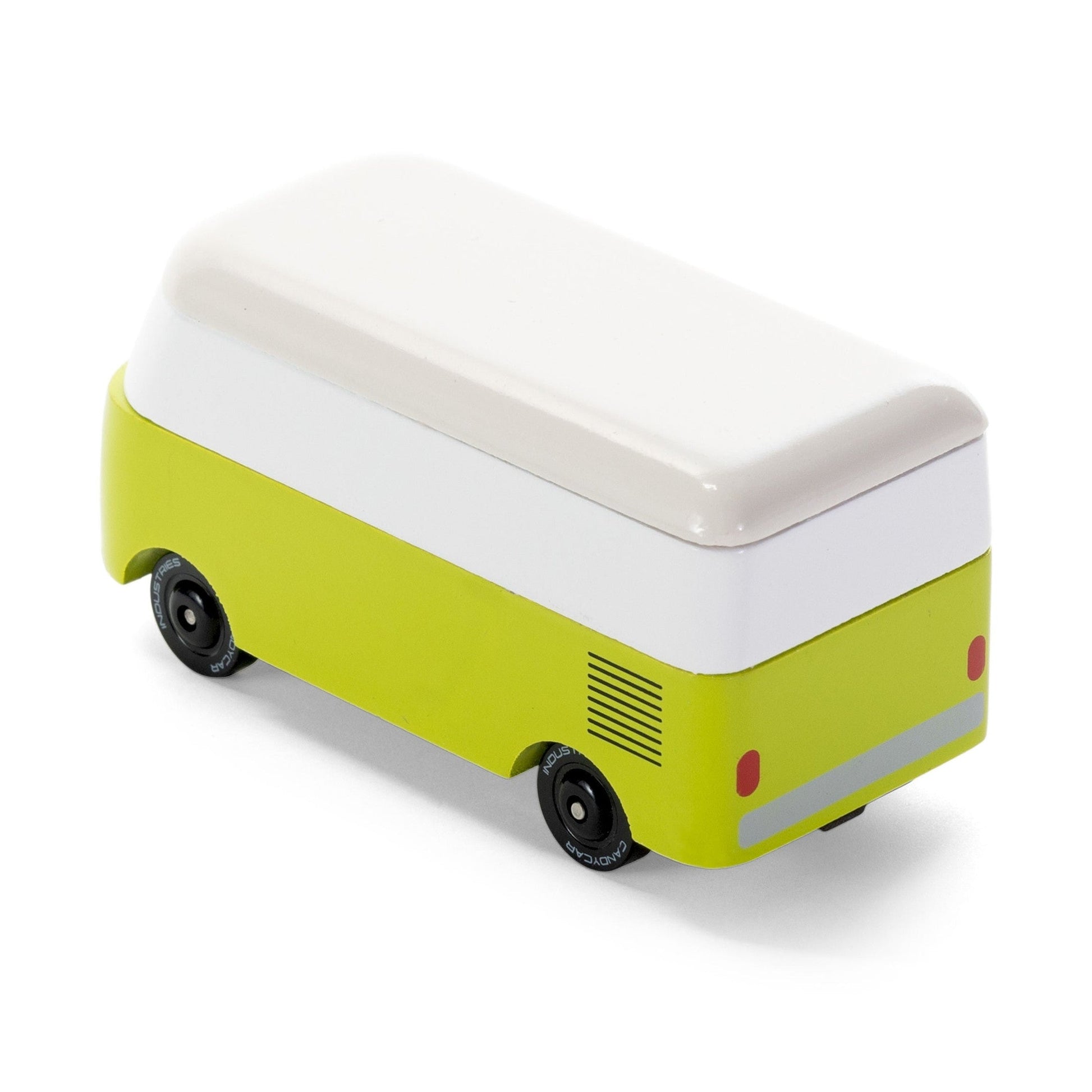 green and white vw toy bus on a white background