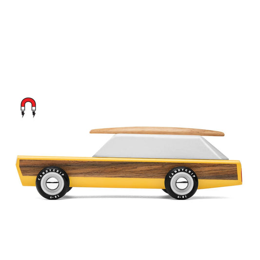 Wooden and yellow toy car with a white interior on a white background