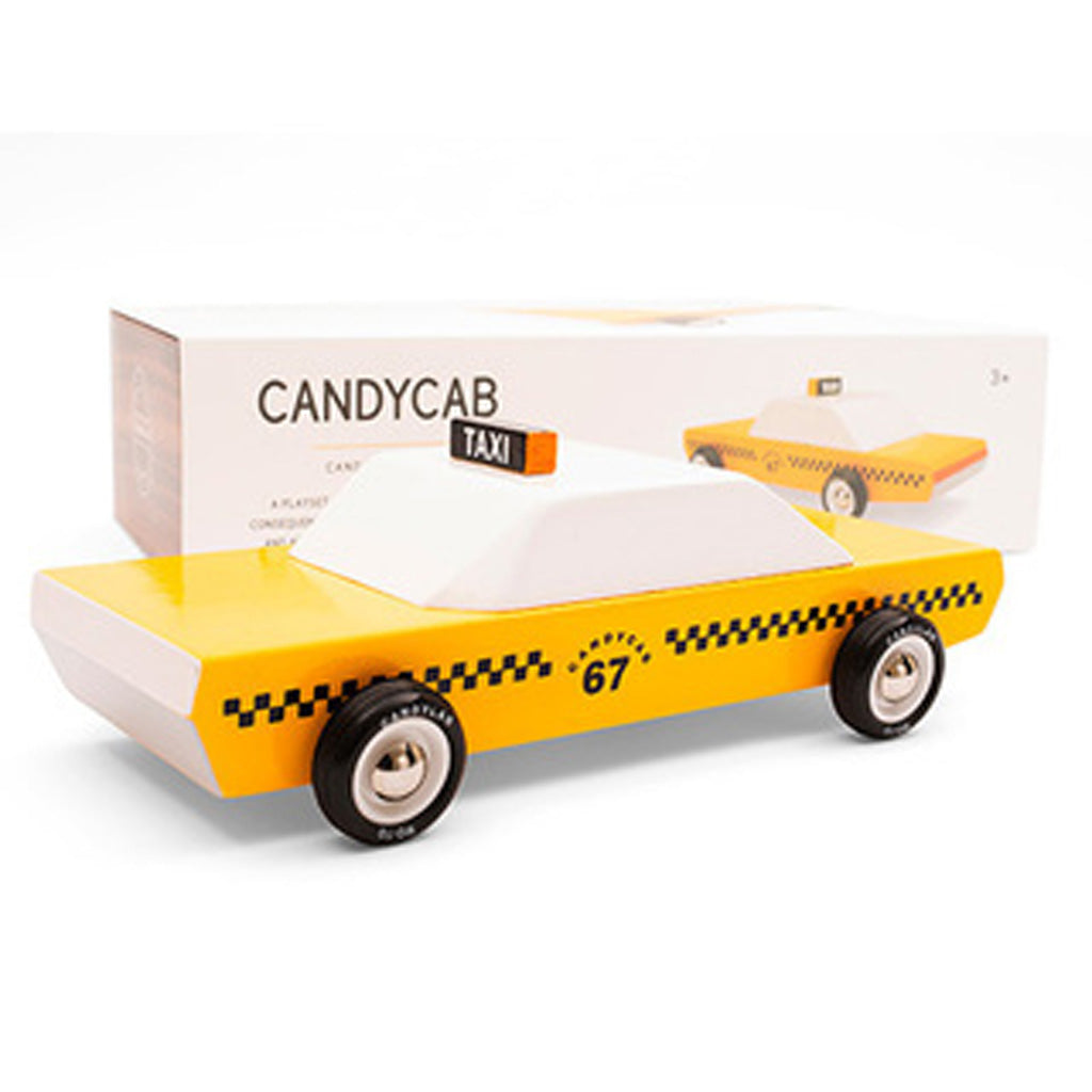 Toy car shaped like a taxi with 'Candycab' branding on a white background