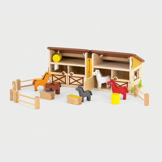 Portable wooden toy barn opened up wide to reveal internal animal stalls and spacious play areas.


