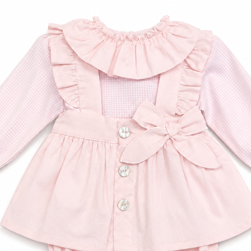 Frill collar bow and button detail on Little Nosh baby girls pink pinafore set