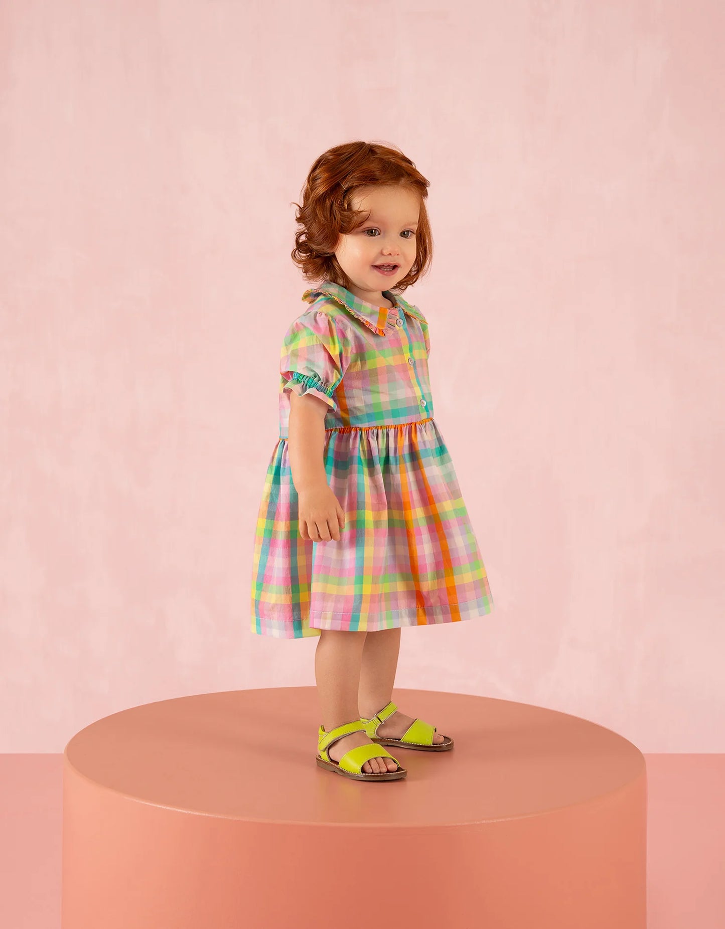 Little girl in Oilily girls cotton dress in vibrant colours