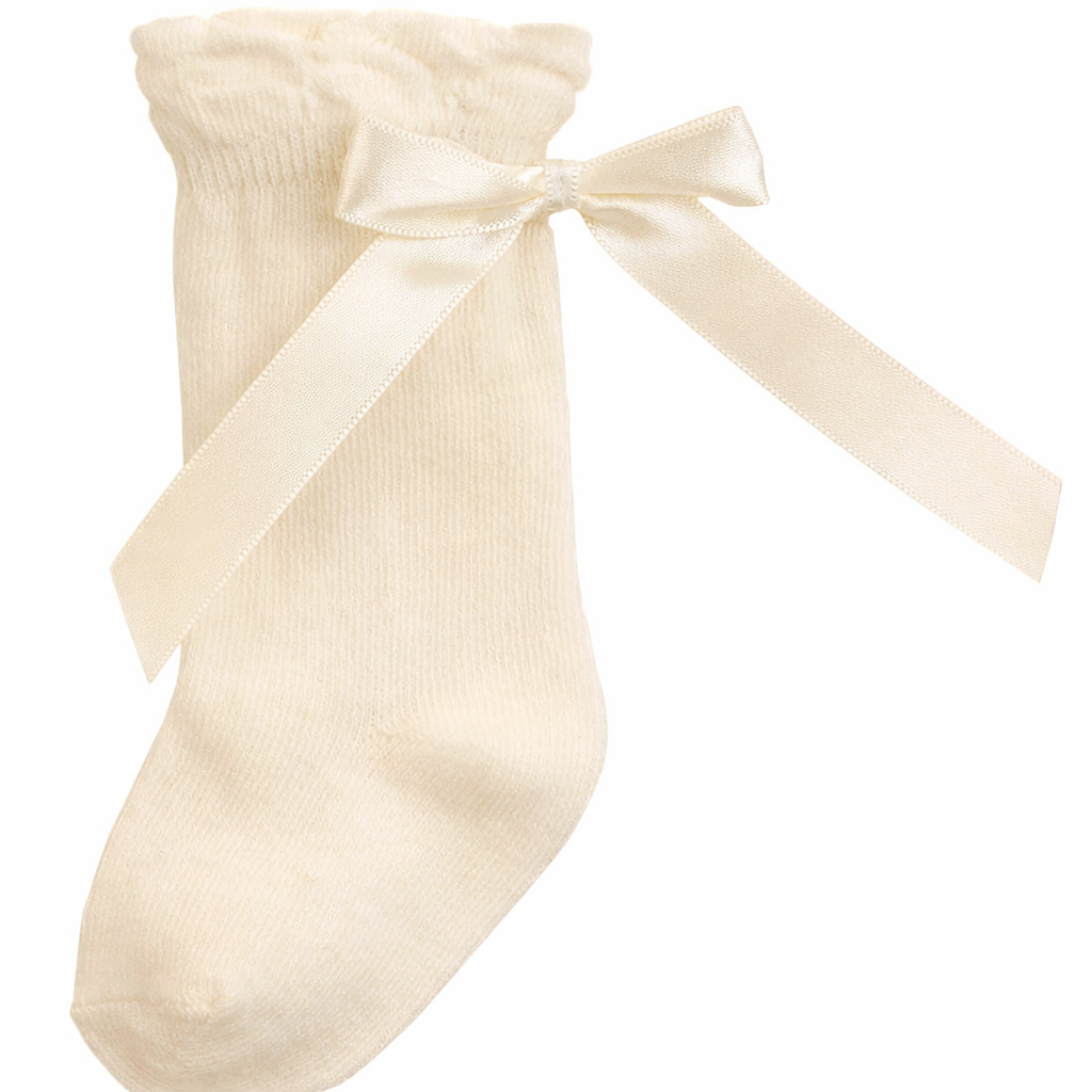 Ivory knee high cotton ribbon tie socks for babies and children