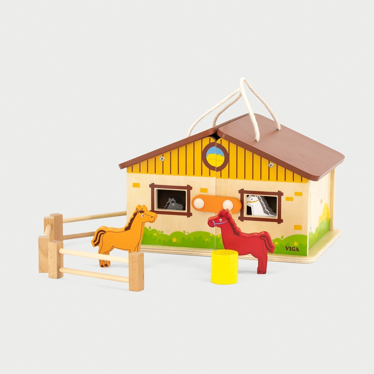Traditional foldable wooden toy stable and farmyard playset closed view with carrying handles.
